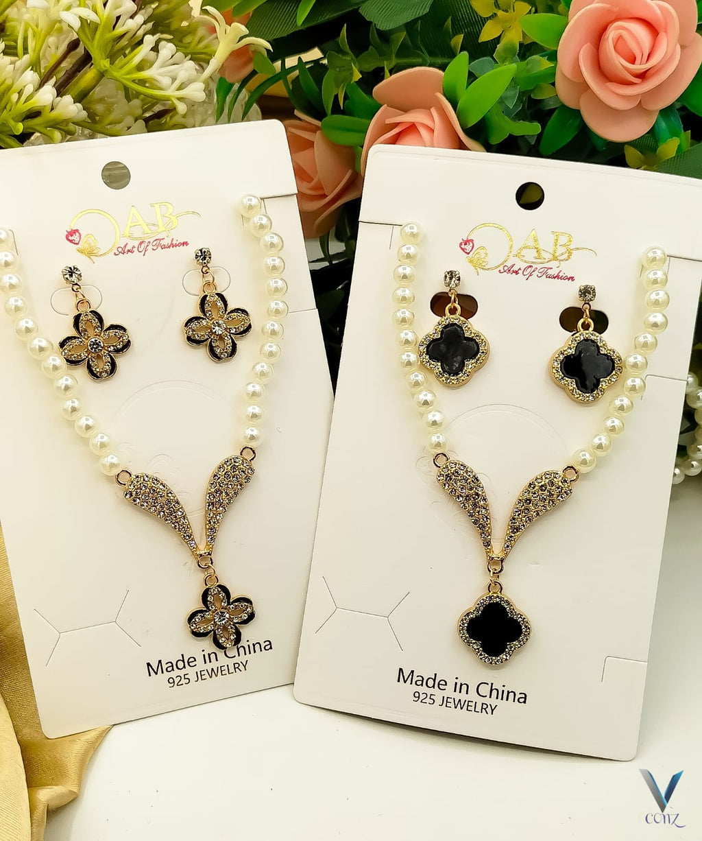Elegant Pearl Necklace & Earrings Set – Black Floral & Bow D